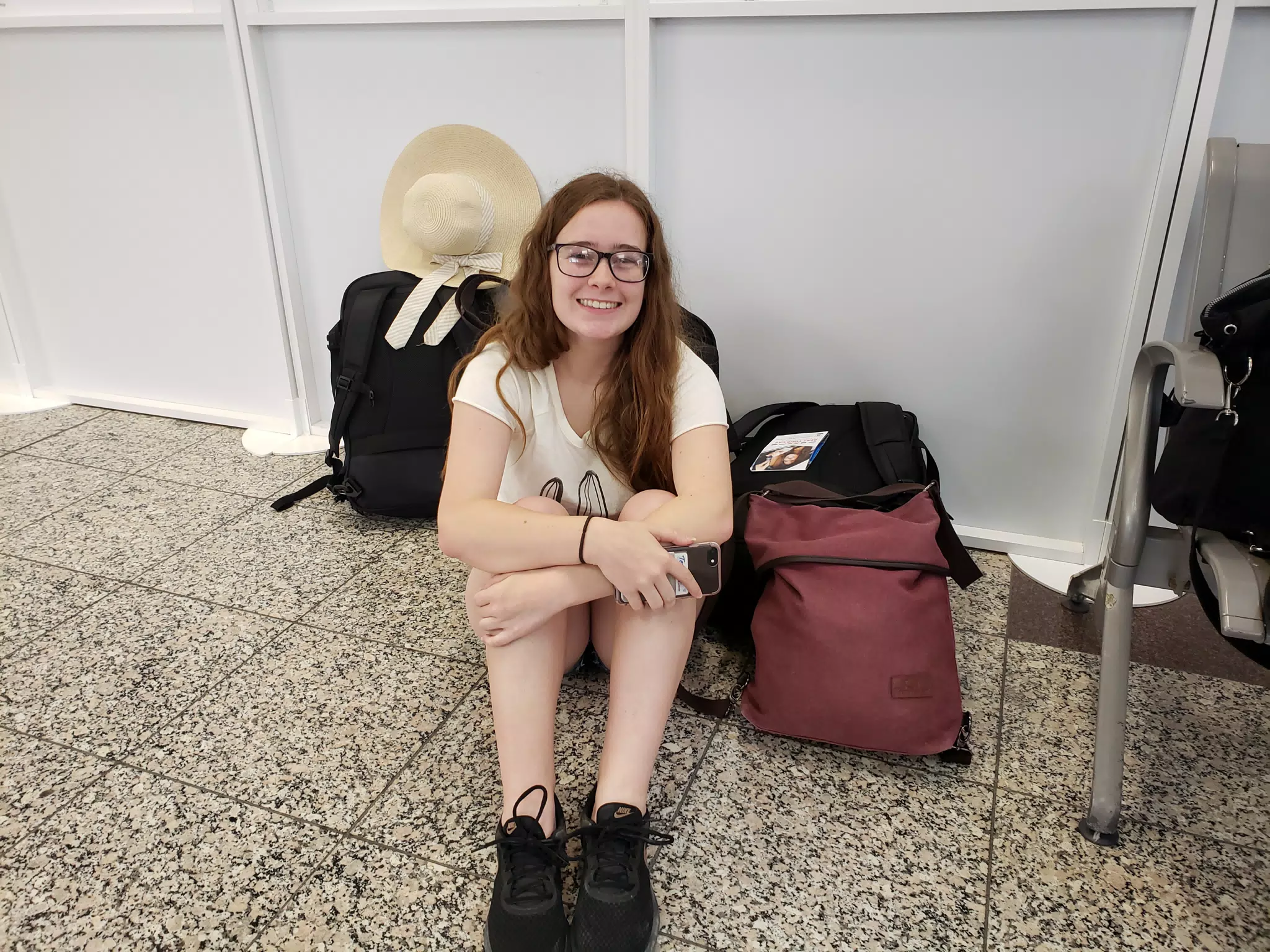 Madeline Waiting at the Santorini Airport