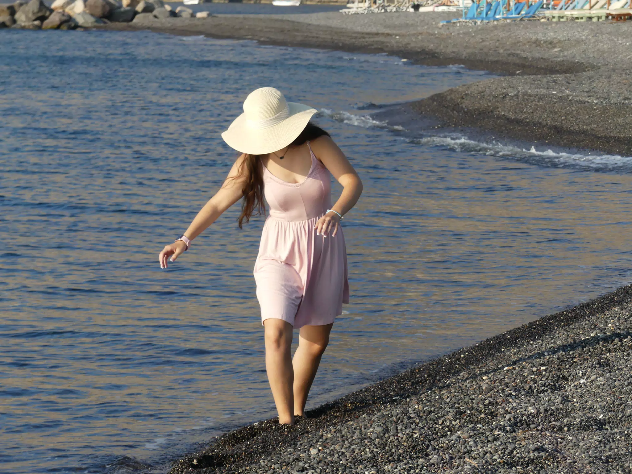 Girl Walking on Kamari Beach