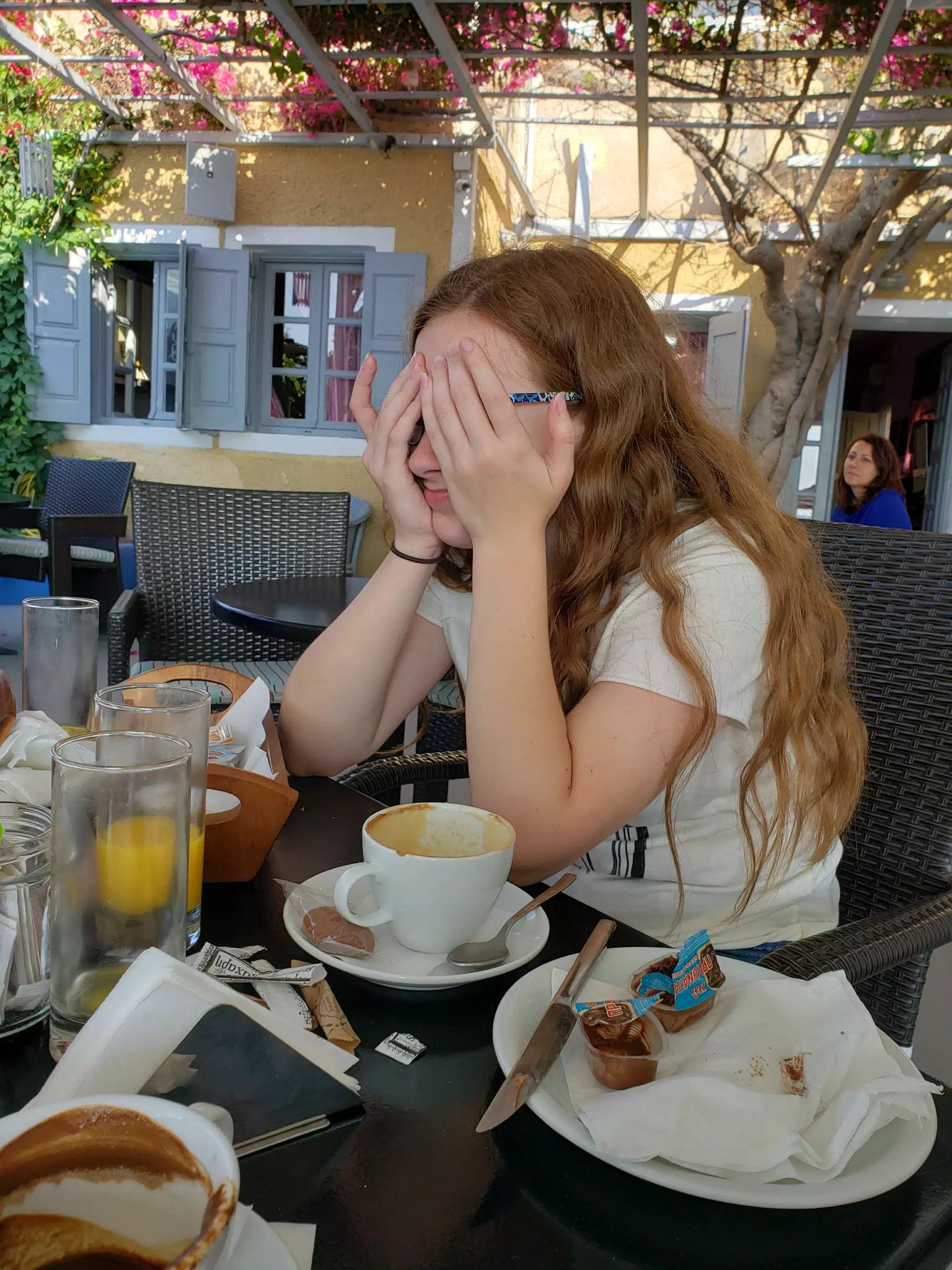 Madeline at Breakfast in Kamari, Santorini, Greece