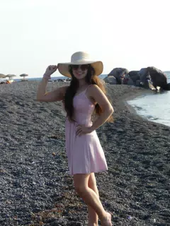 Emily with Hat on Kamari Beach