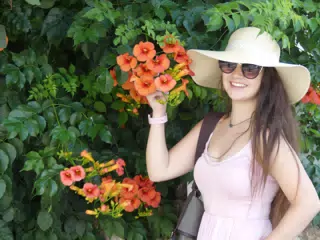 Girl with Flowers on Santorini