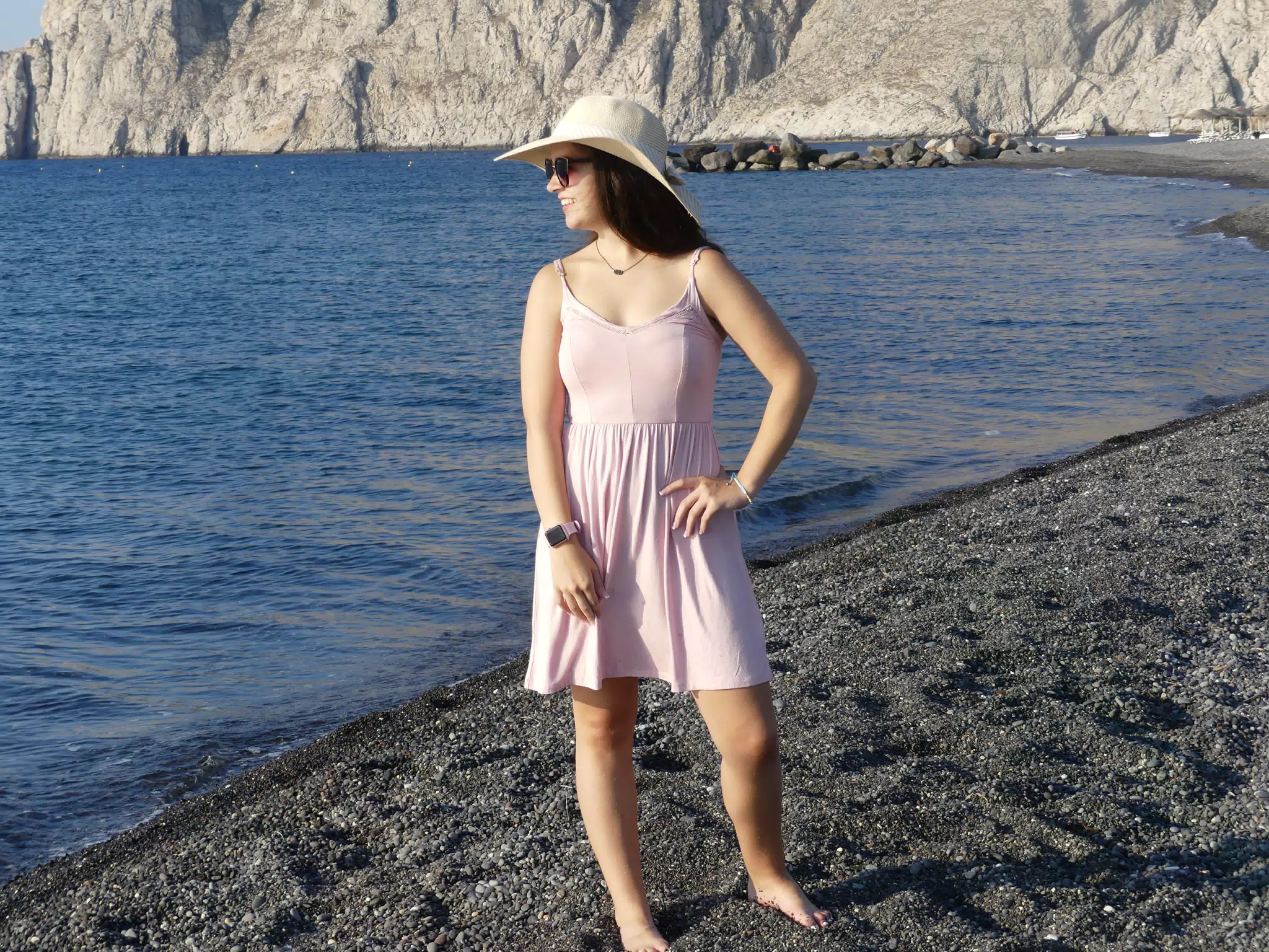 Emily on Beach on Santorini Looking Out to Sea