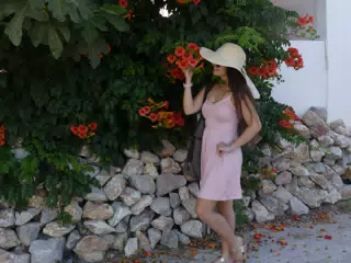 Emily with Red Flowers on Santorini