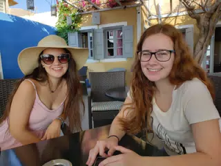 Emily and Madeline at Breakfast in Kamari, Santorini