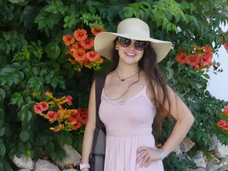 Girl by Flowers