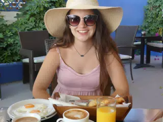Emily Having Breakfast in Kamari