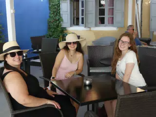 Girls Waiting for Breakfast on Santorini