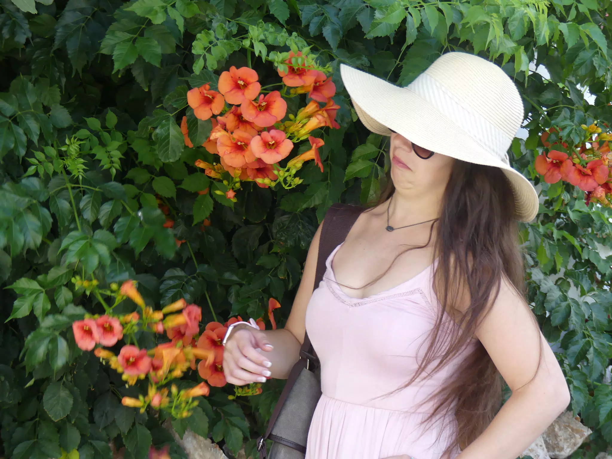 Emily with Flowers in Santorini