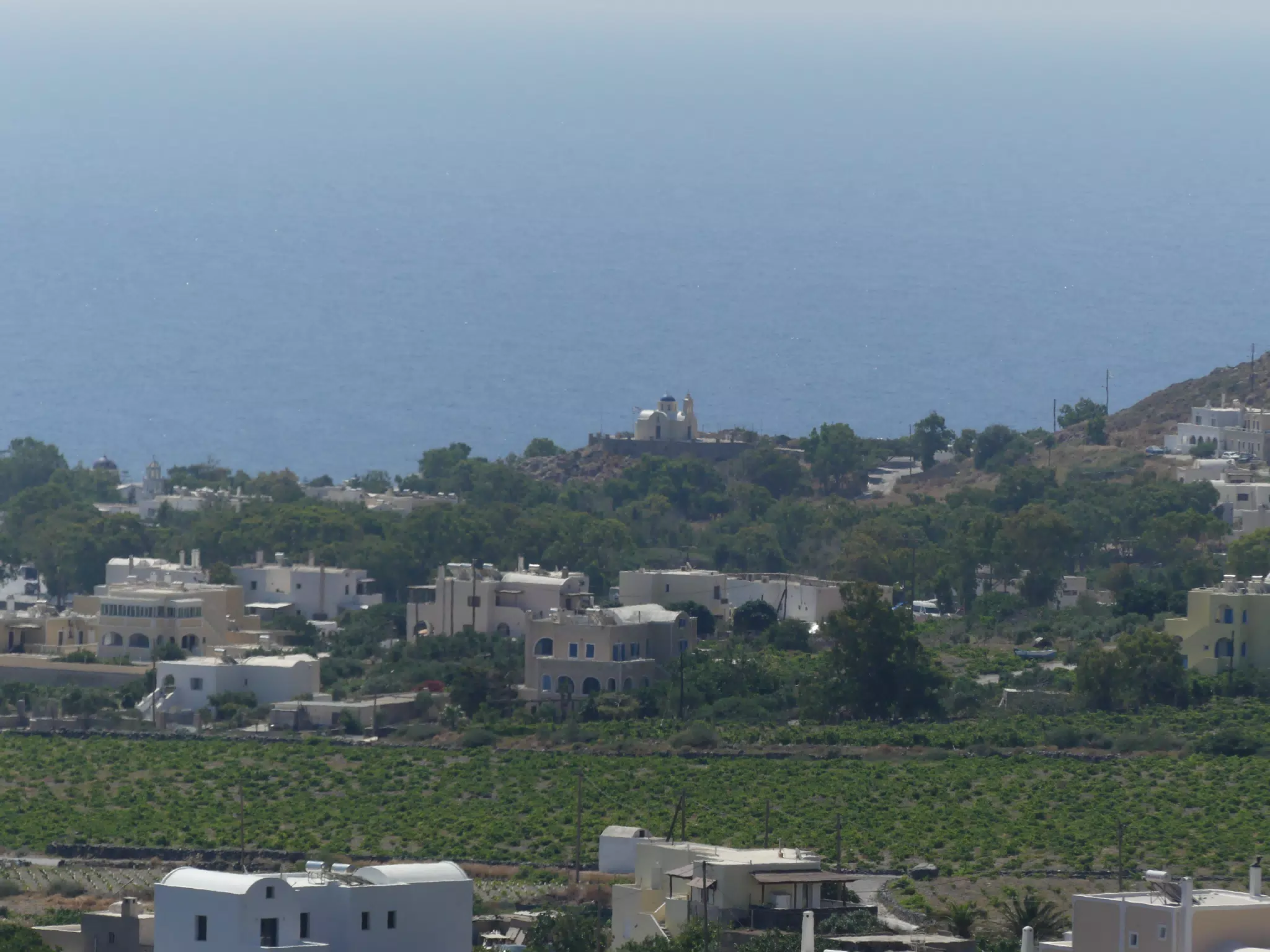 Church in Distance by Sea on Santorini