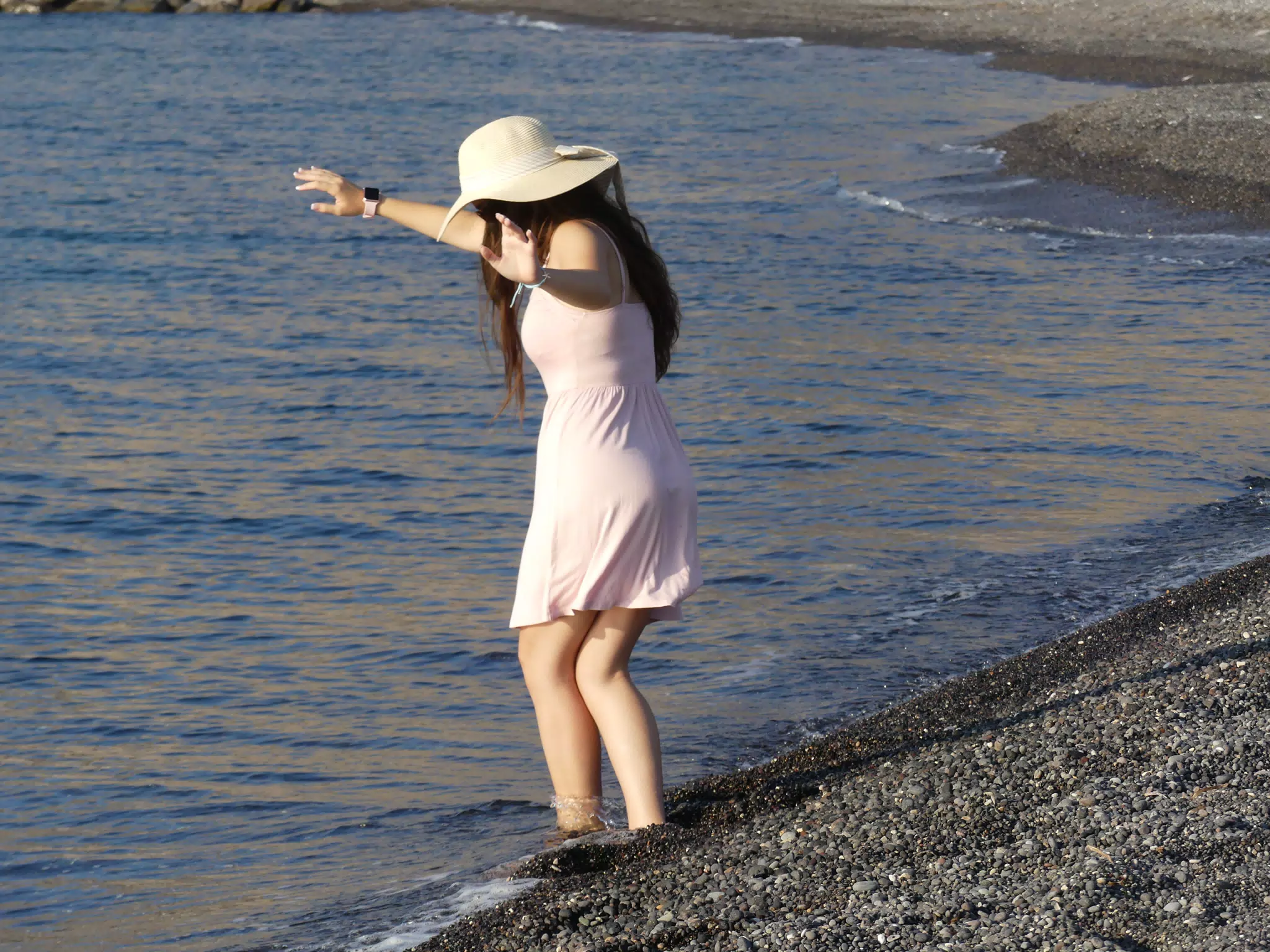 Girl Falling into Water on Santorini