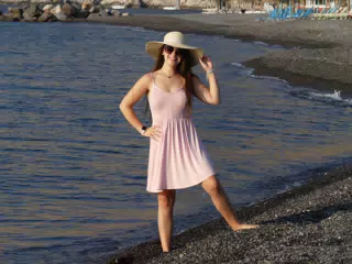 Girl in Hat on Beach