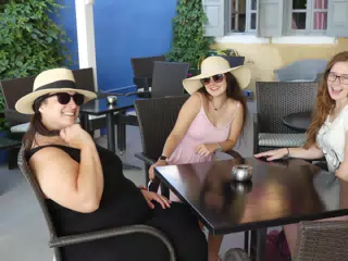 Girls Waiting for Breakfast on Santorini