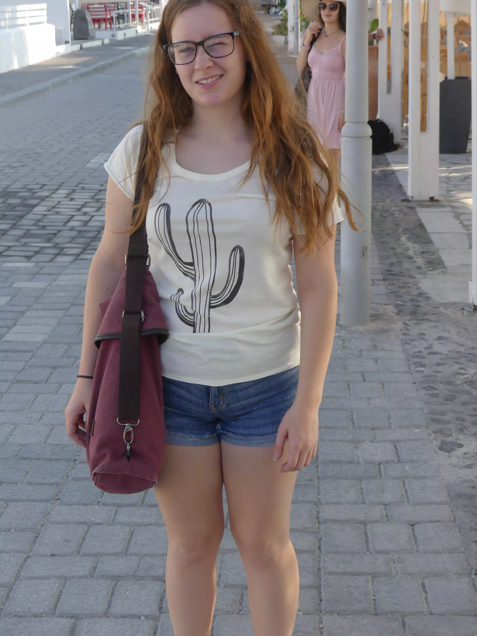 Teen on Street in Kamari Santorini