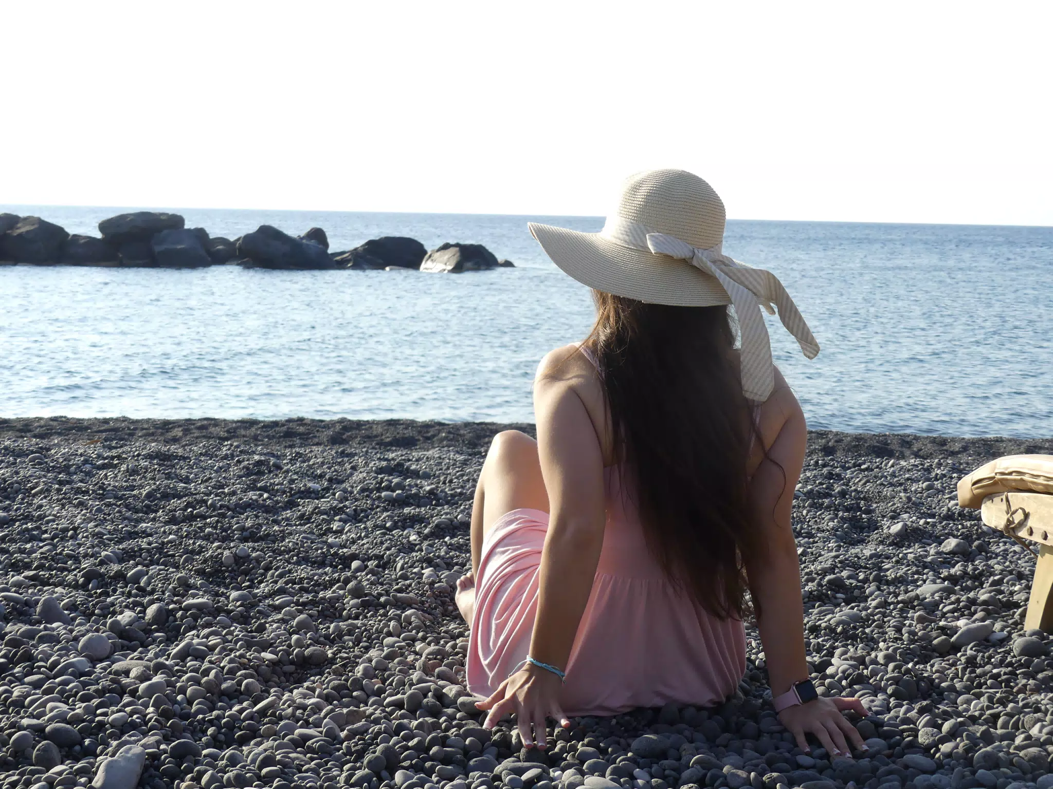 Girl on Beach Looking Out to Sea
