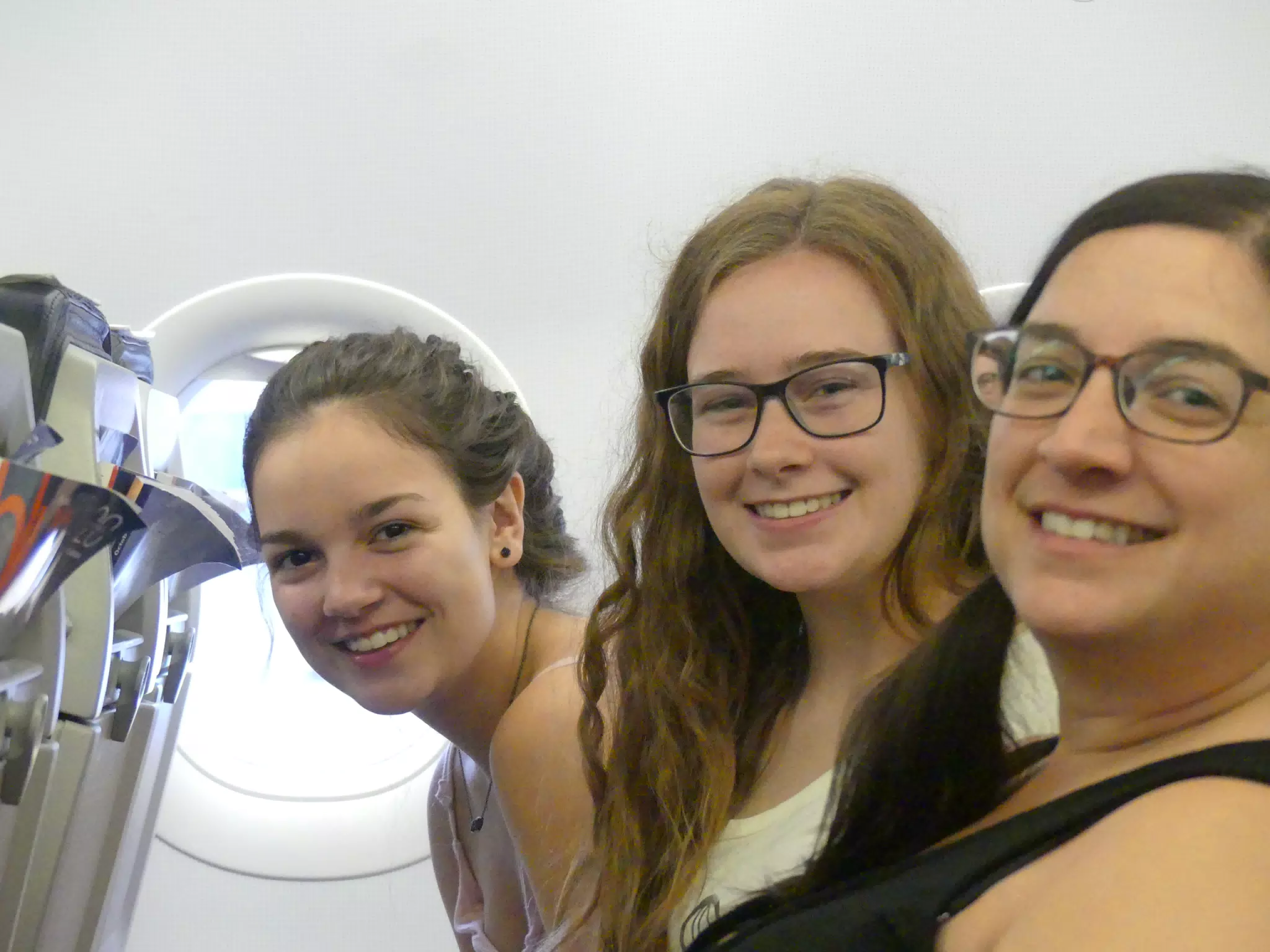 Emily, Madeline & Dominica on Airplane from Athens to Santorini