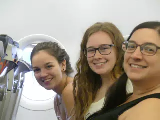 Emily, Madeline & Dominica on Airplane from Athens to Santorini