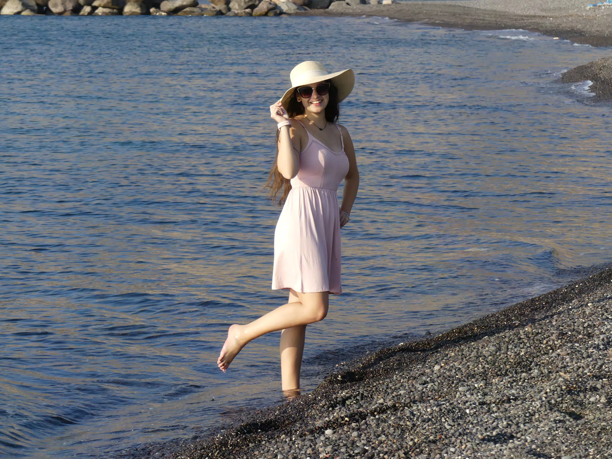 Emily in Water on Santorini Beach