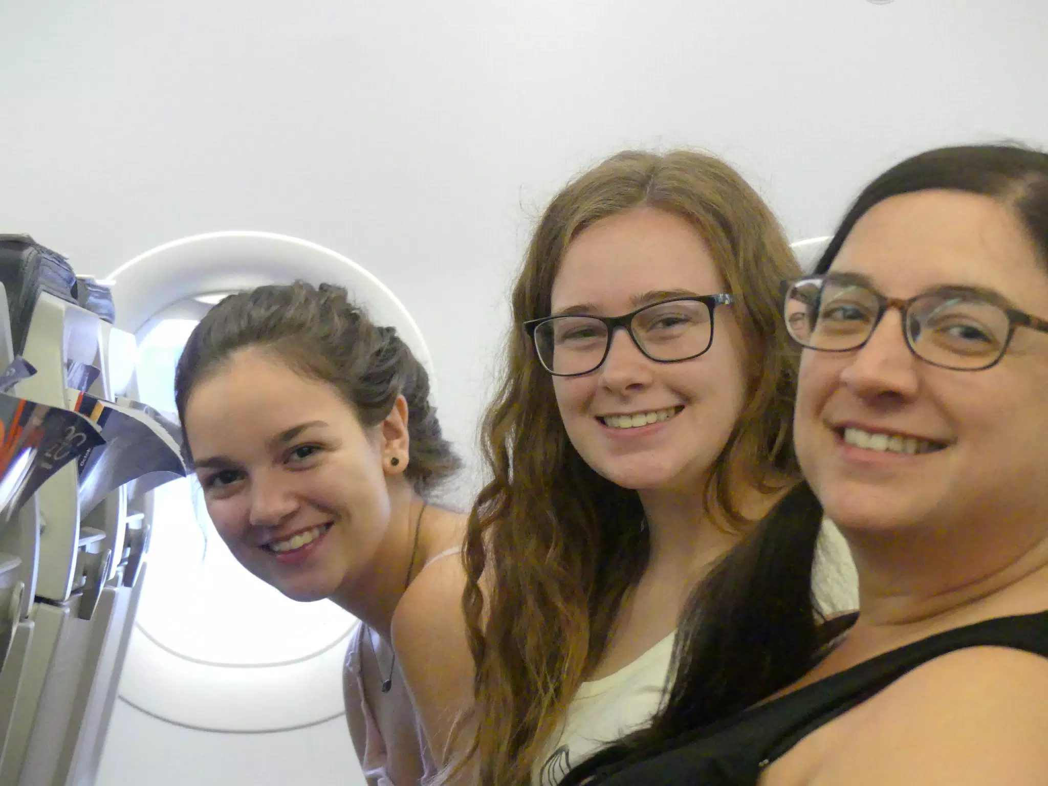 Emily, Madeline, Dominica on Plane