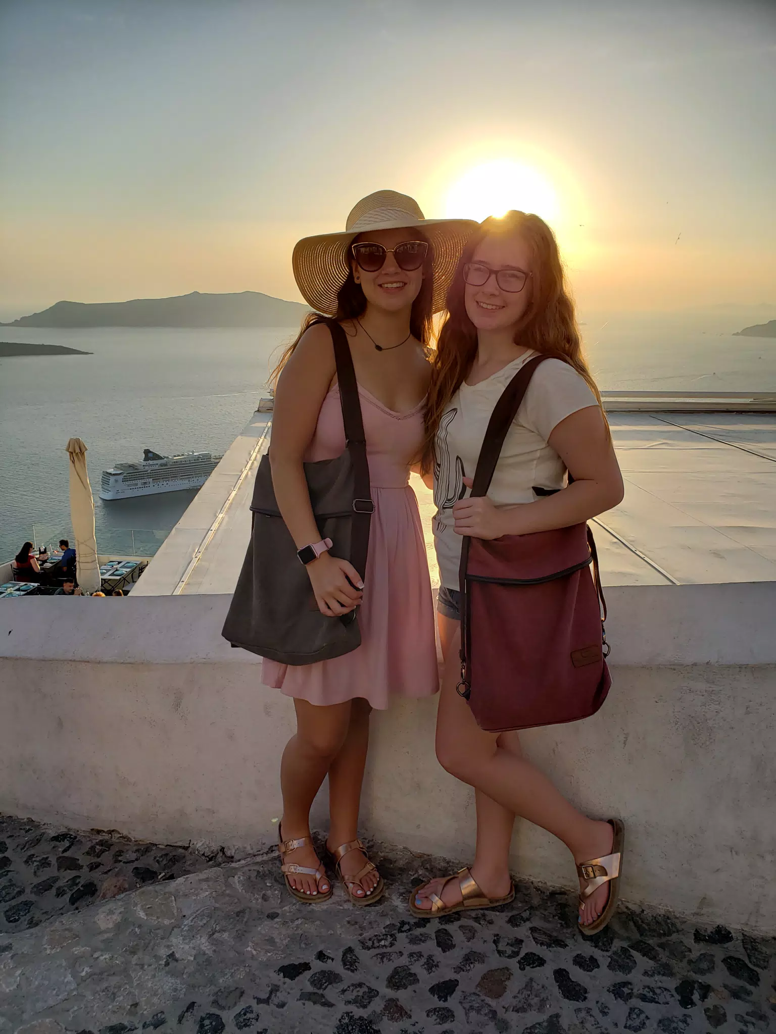 Emily and Madeline on Santorini at Sunset in Thira