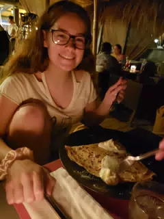Madeline Having a Crepe at King's Cafe Kamari