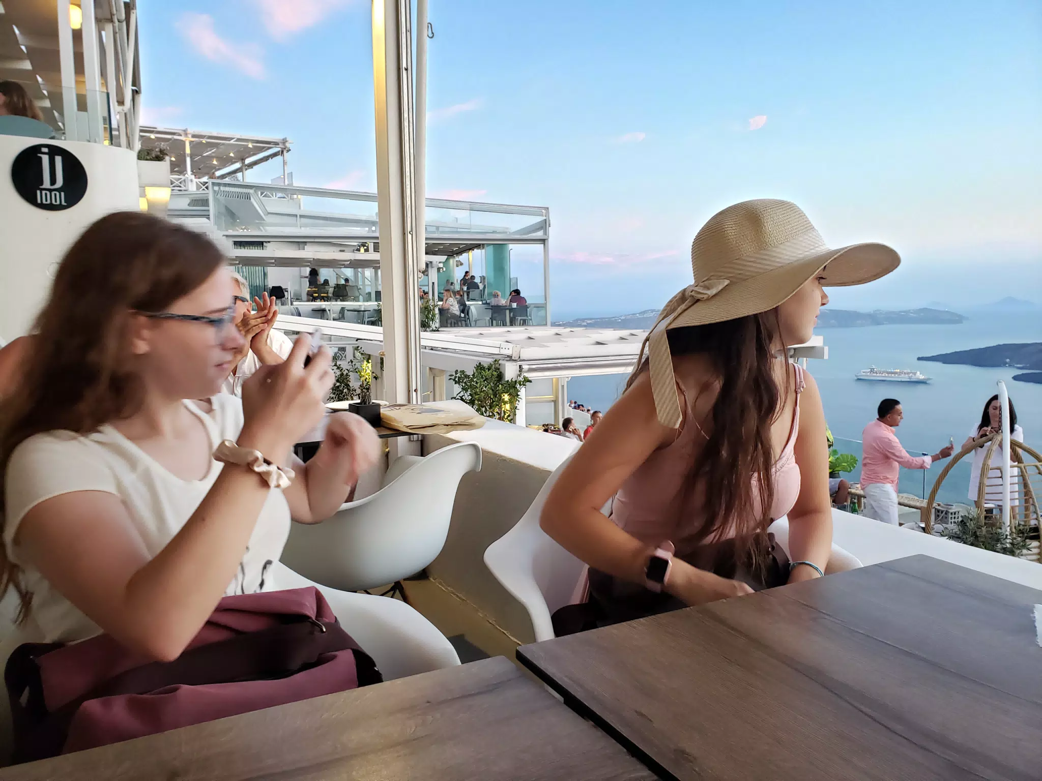 Girls with Dinner View in Thira, Santorini