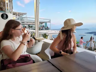 Girls with Dinner View in Thira, Santorini