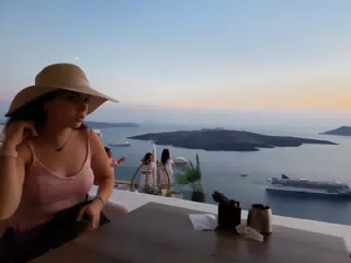 Girl in Restaurant in Thira