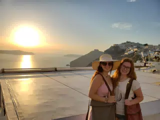 Emily and Madeline at the Sunset over the Aegean from Thira, Santorini