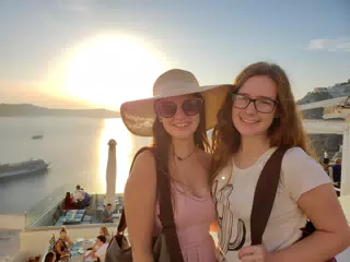 Emily and Madeline at Sunset on Santorini