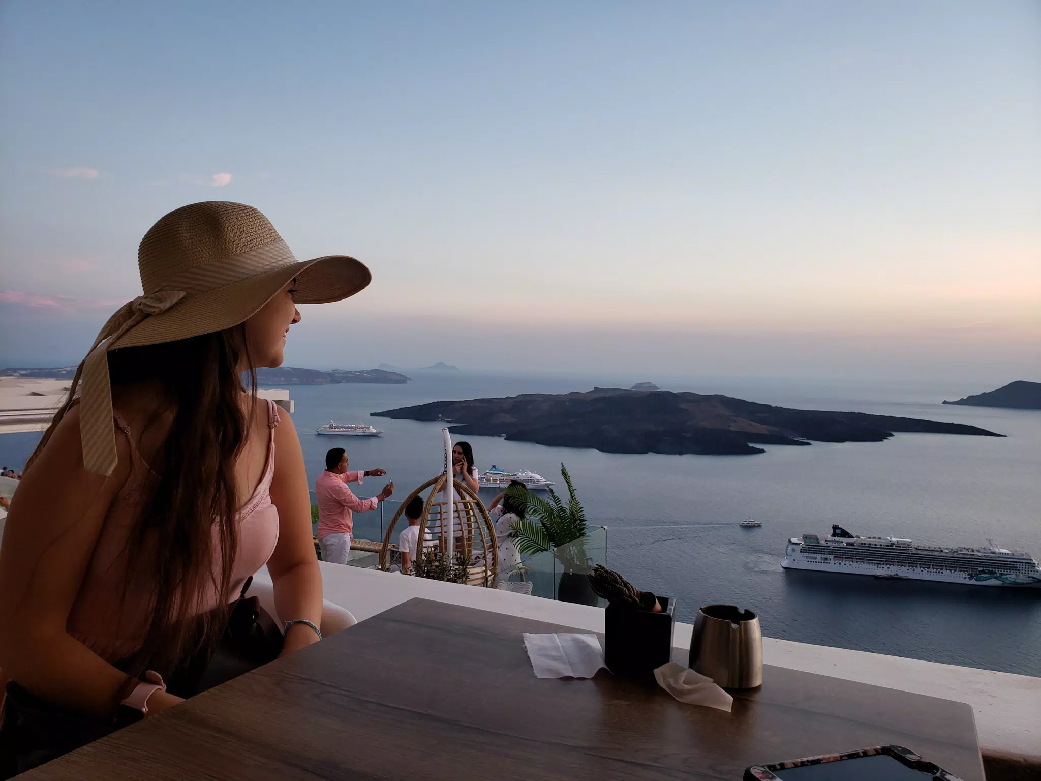 Emily at Restaurant in Thira Looking Out to Sea