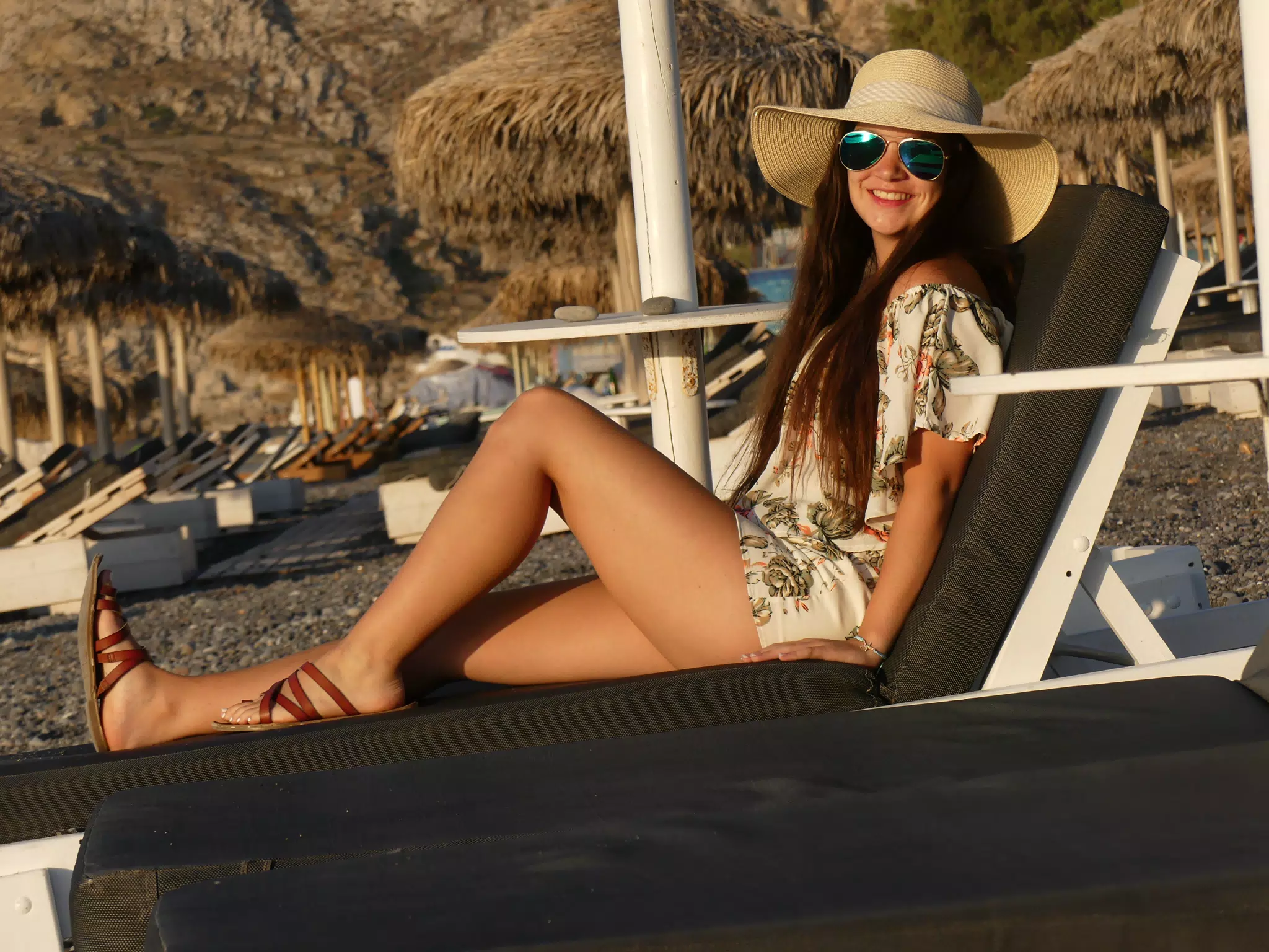Emily Grice on Lounge Chair on Kamari Beach, Santorini