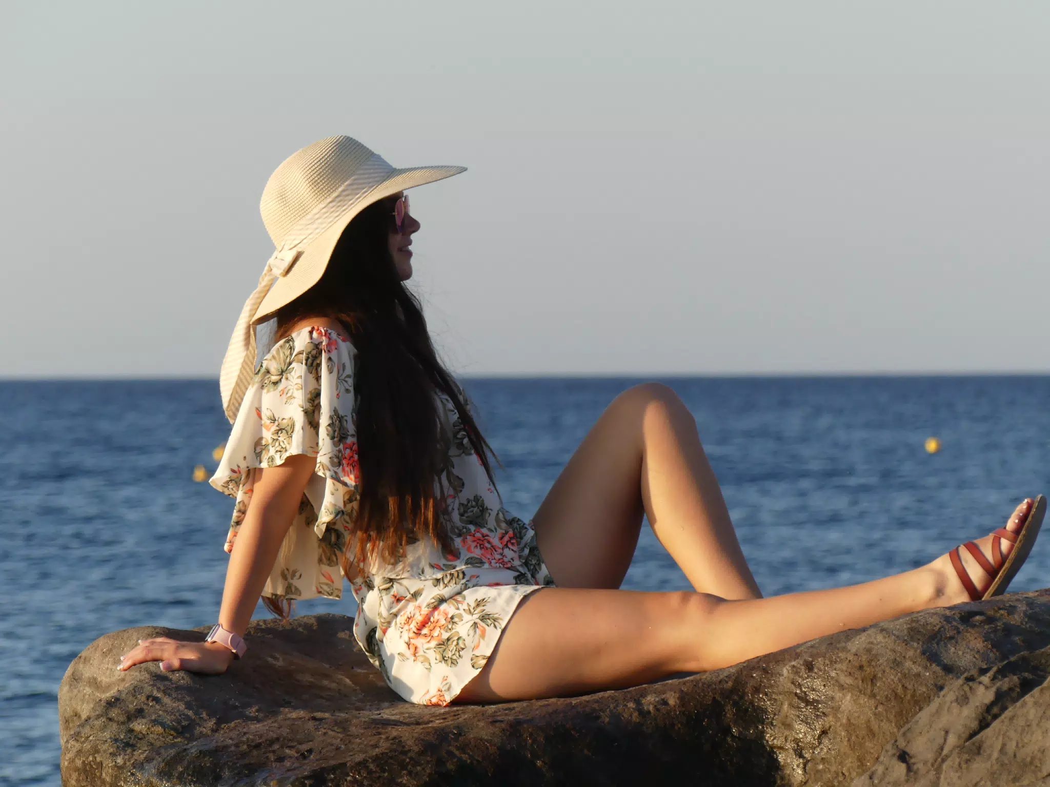 Emily at the Rocks at Sunrise on Santorini