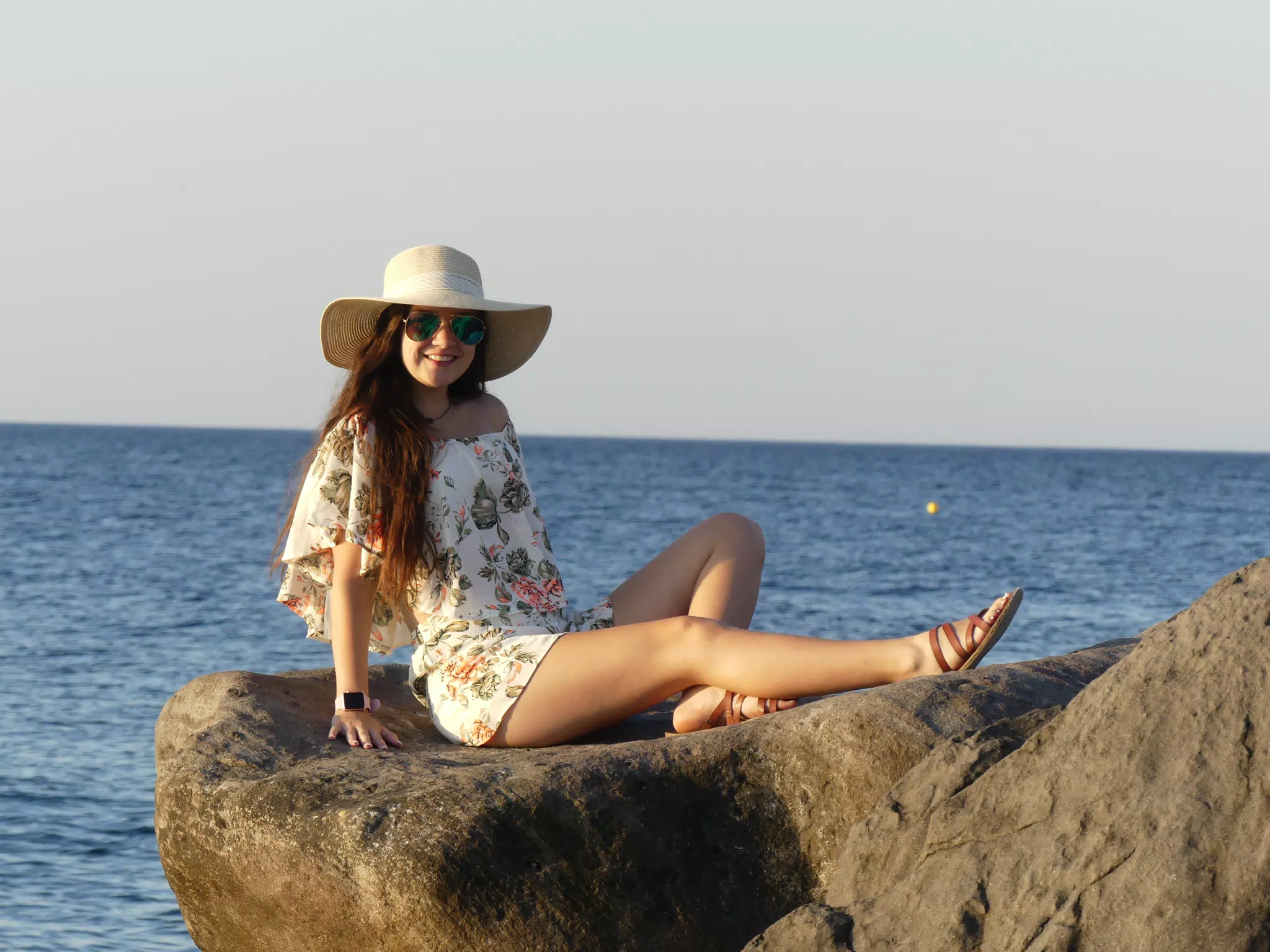Girl on the Beach by the Aegean Sea on Santorini