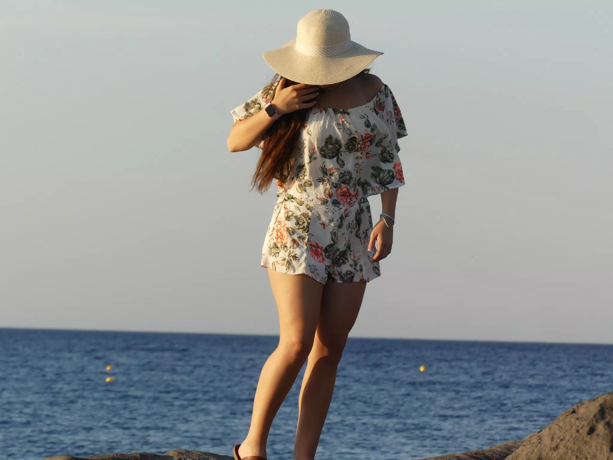Girl on Rocks on Santorini
