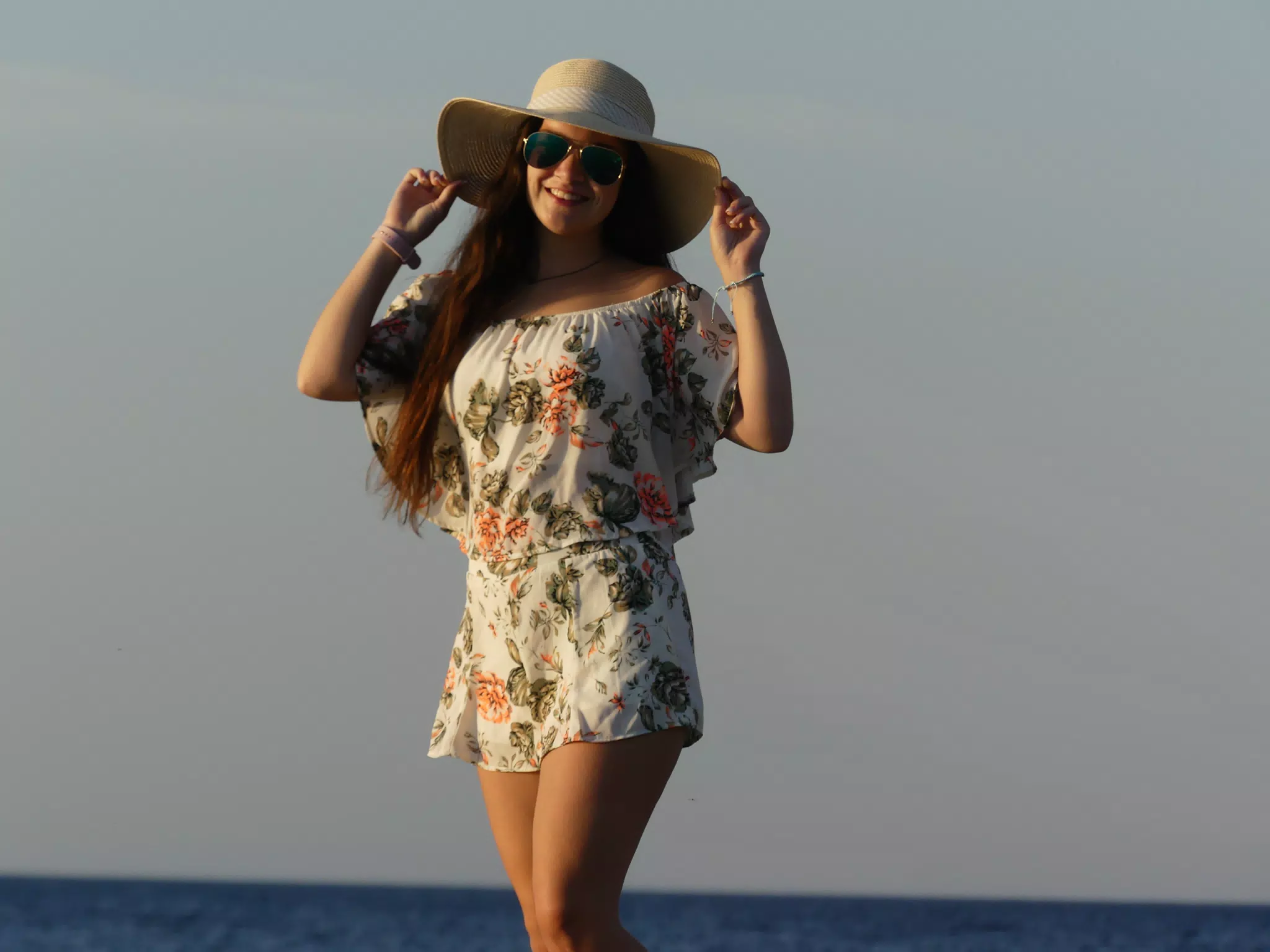 Emily High on the Rocks on the Beach on Santorini
