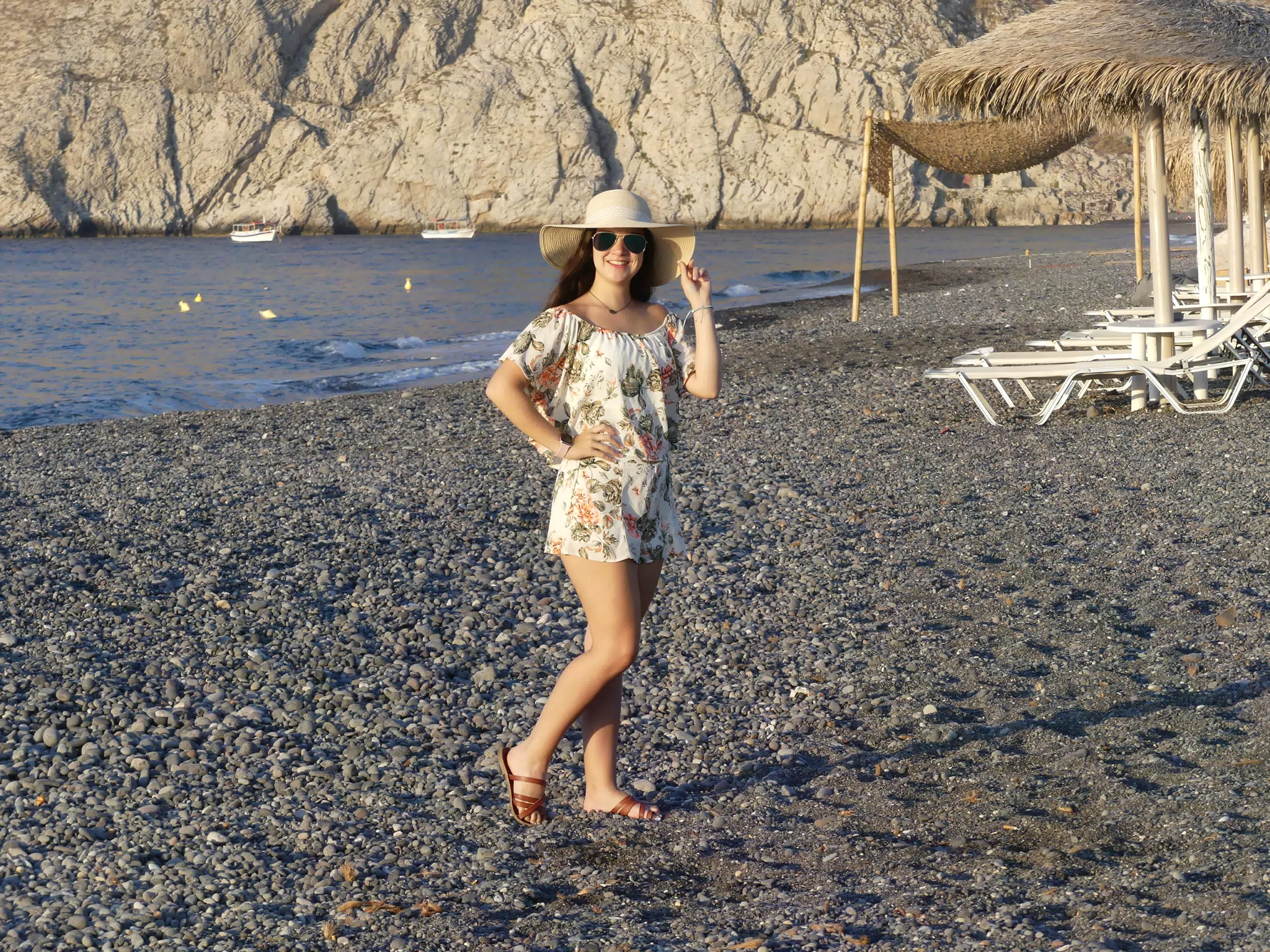 Emily in Hat on Kamari Beach on Santorini
