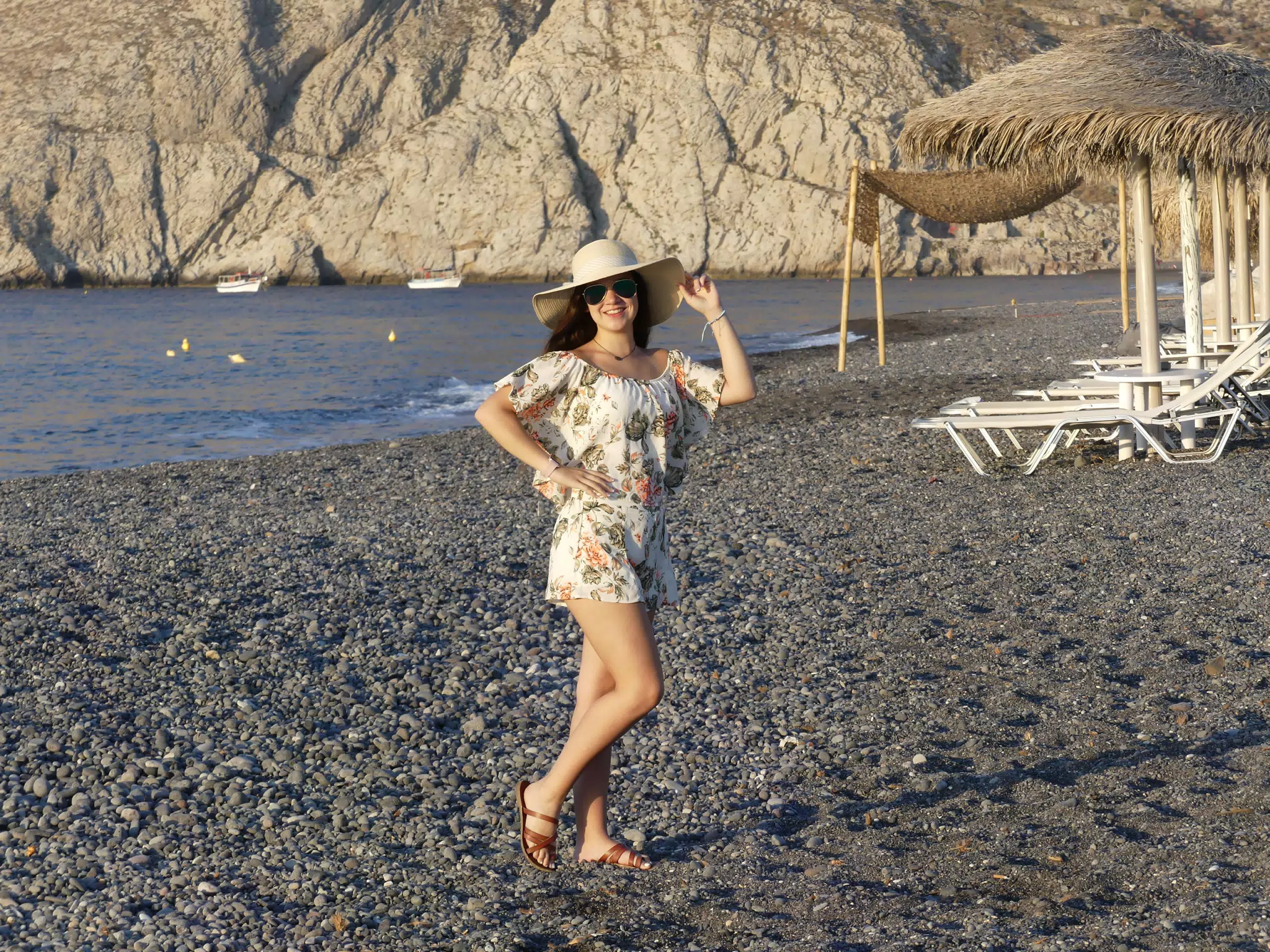 Emily Posing on Kamari Beach on Santorini in Greece