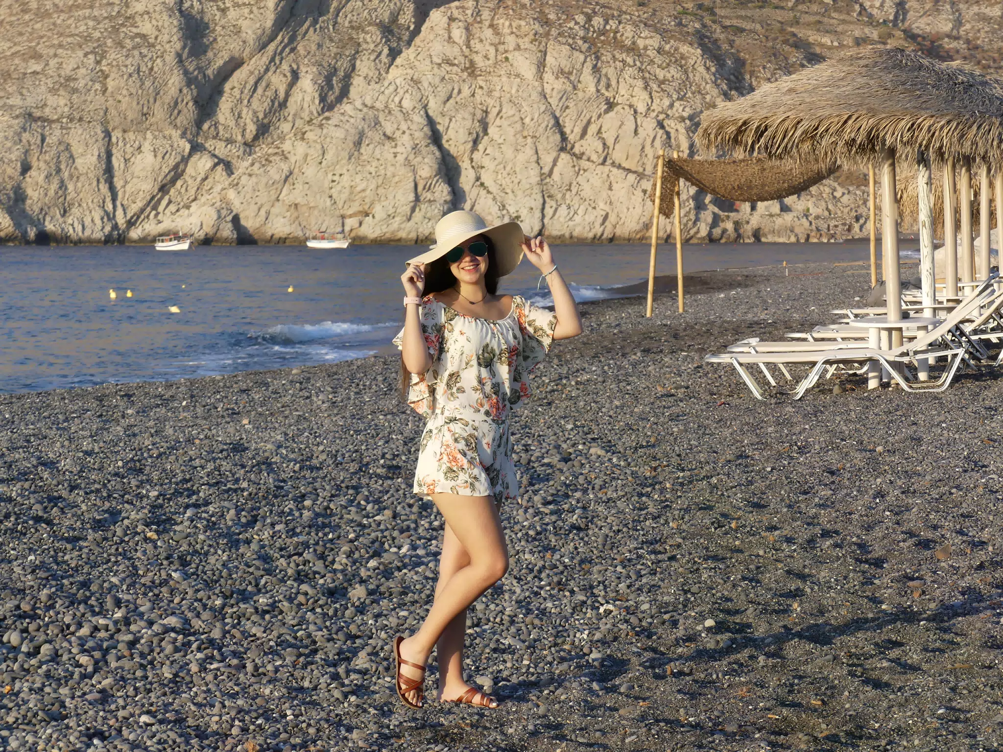 Emily with Hat on Beach on Santorini
