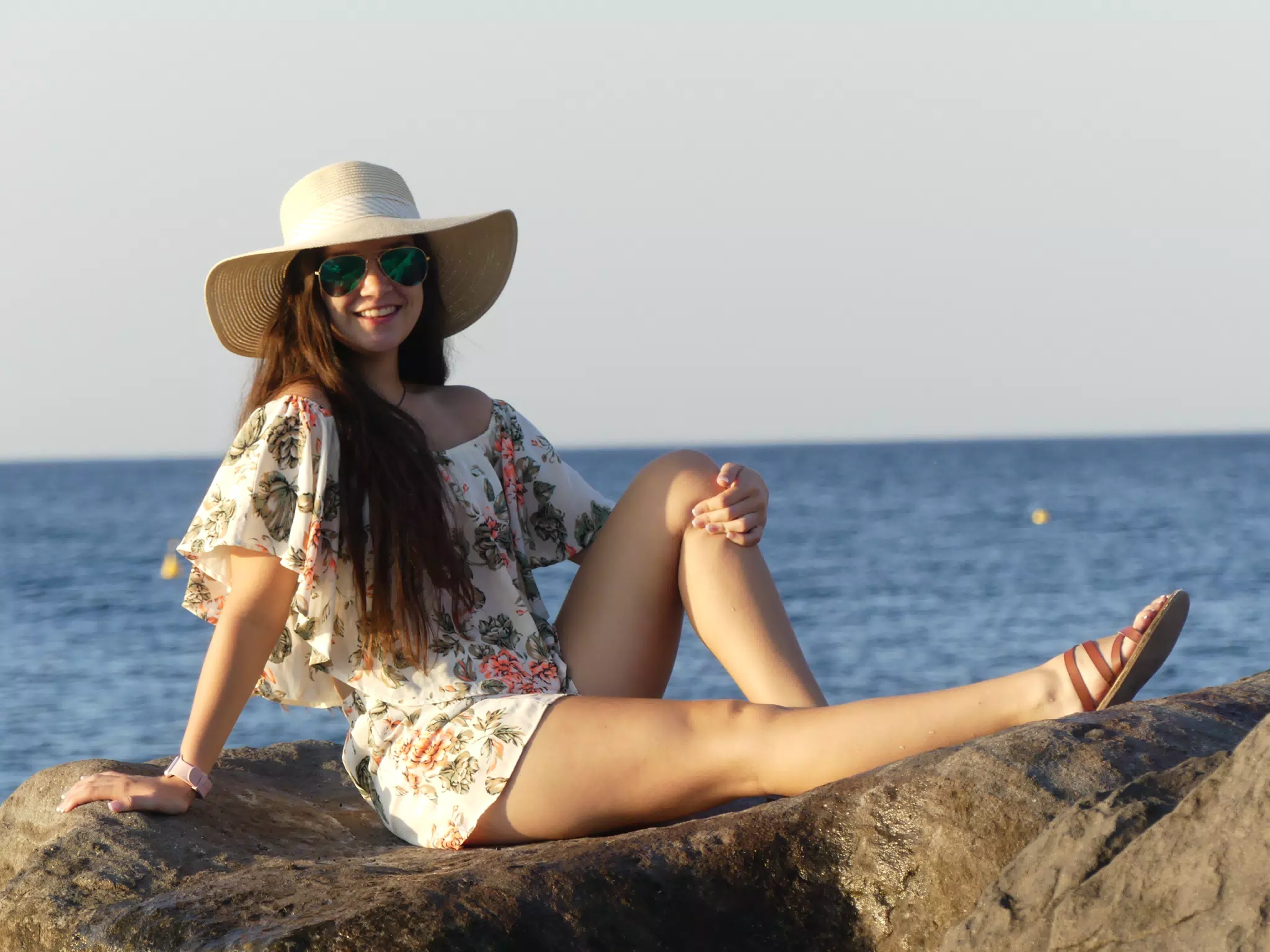 Girl at Sunrise on the Beach on Kamari, Santorini, Greece