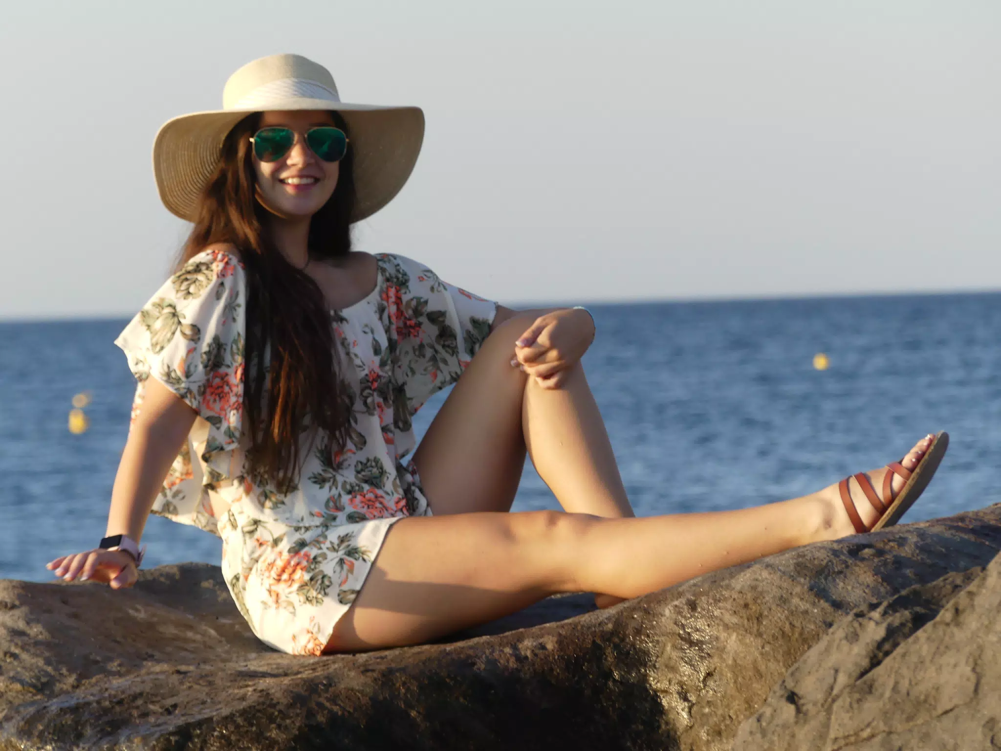 Emily on the Rocks on Santorini at the Beach by the Sea