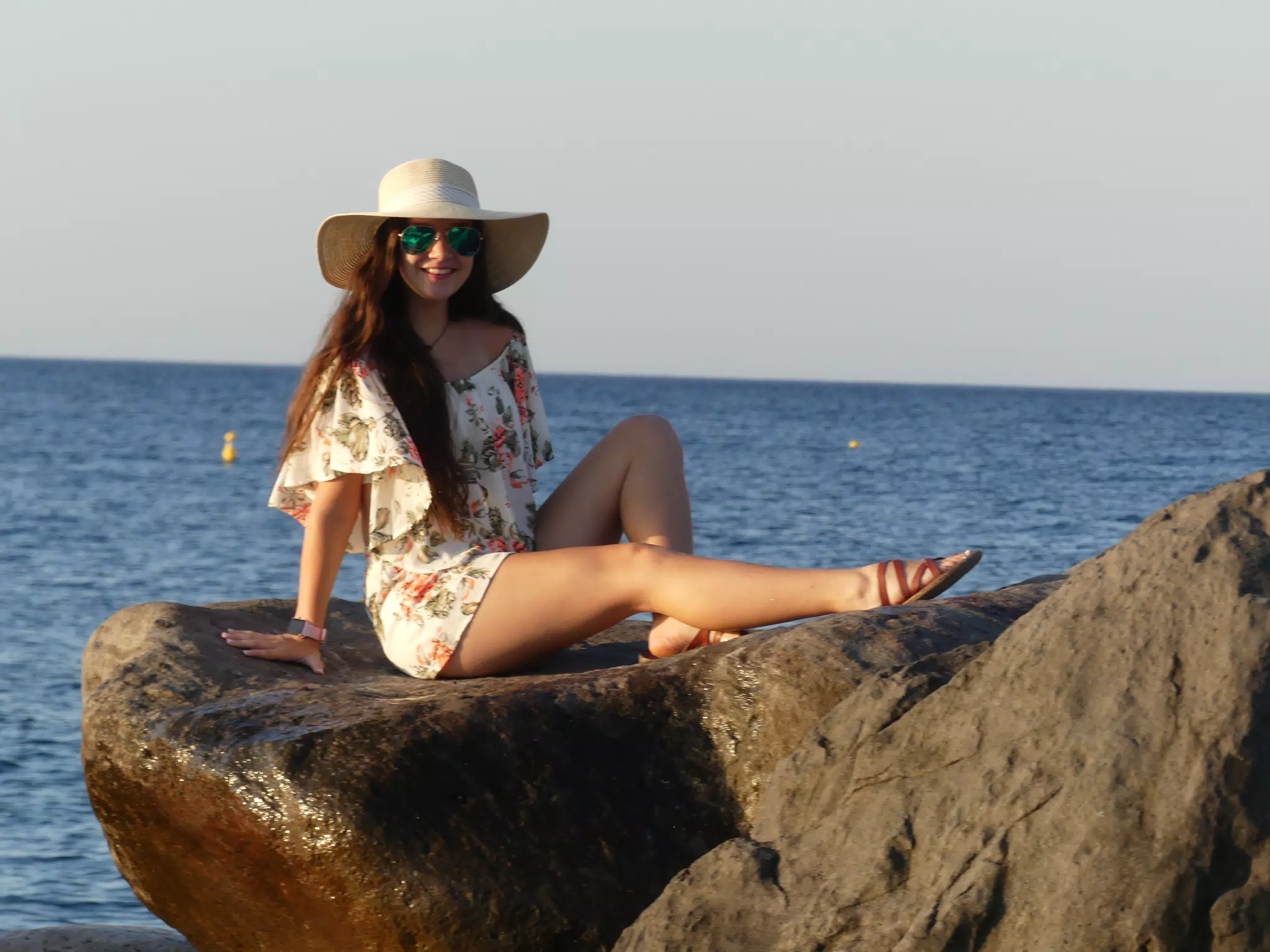 Girl in the Sunrise on Santorini Beach