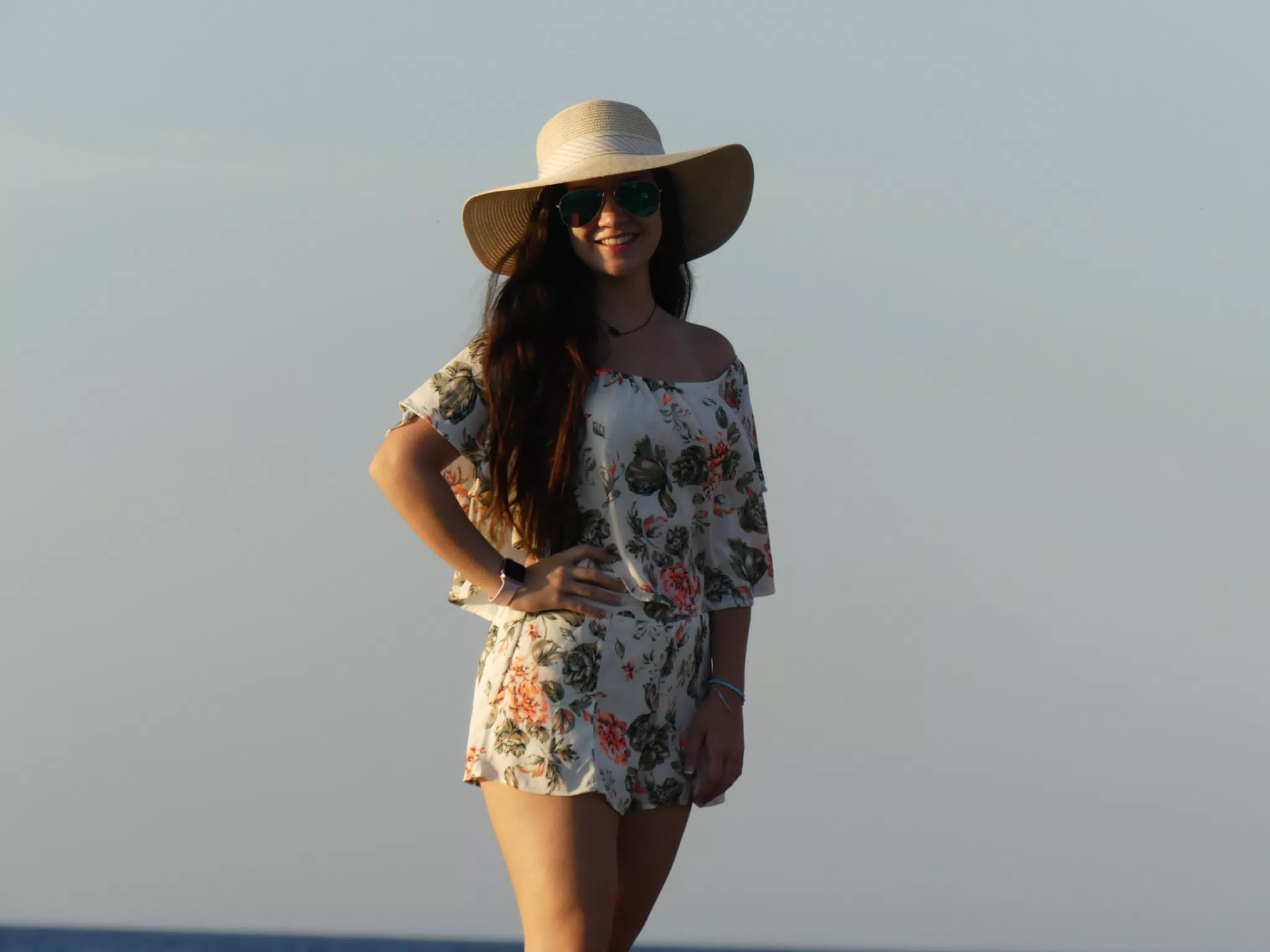 Emily Posting on the Rocks on Santorini