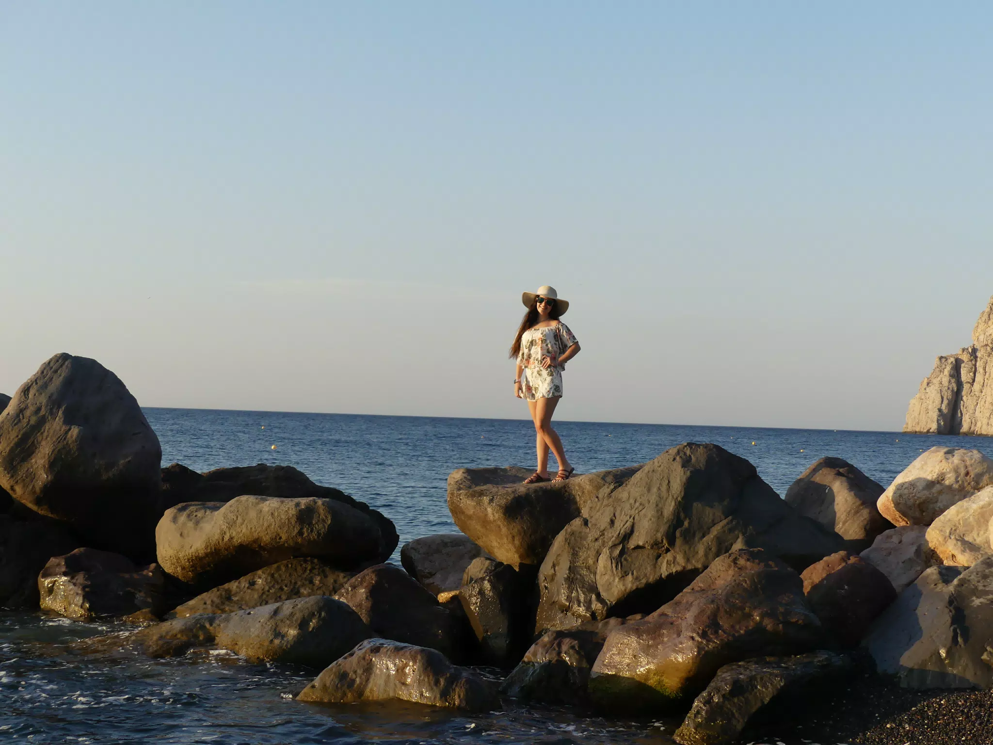 Emily on the Rocks on Santorini Island