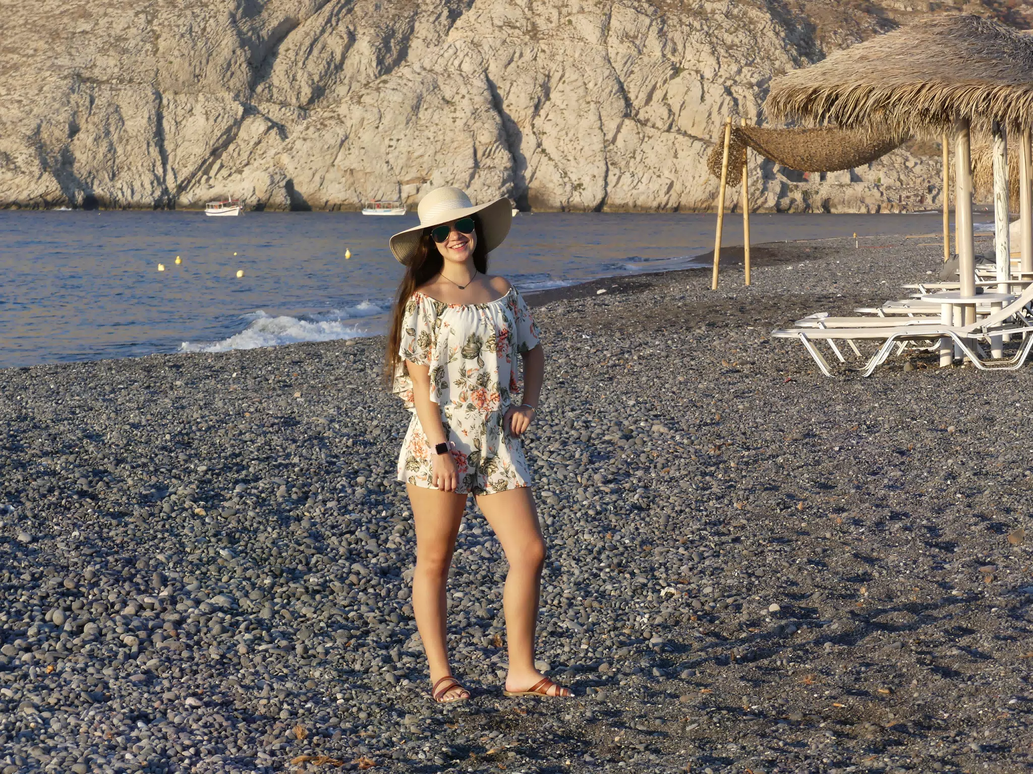 Emily Grice Posing on Kamari Beach on Santorini, Greece