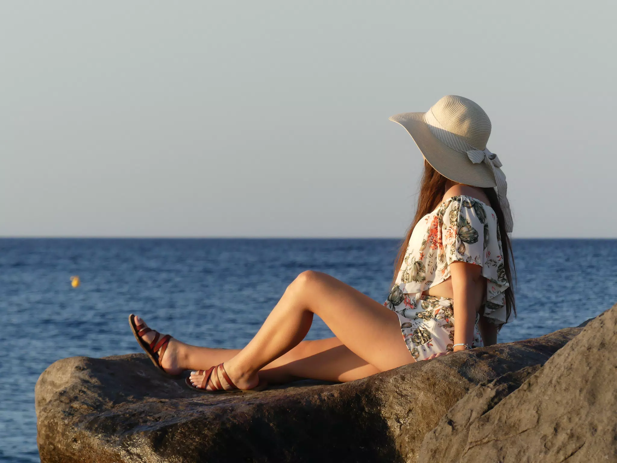 Girl on Beach on Santorini at Sunrise