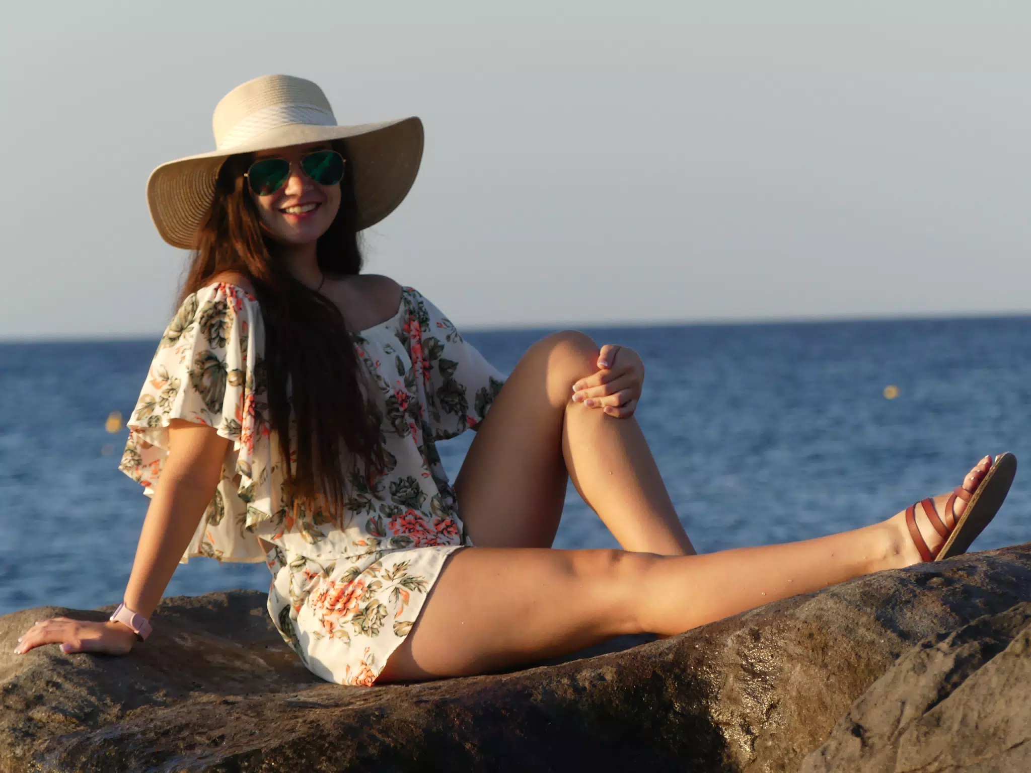 Girl in Hat by the Sea on Santorini