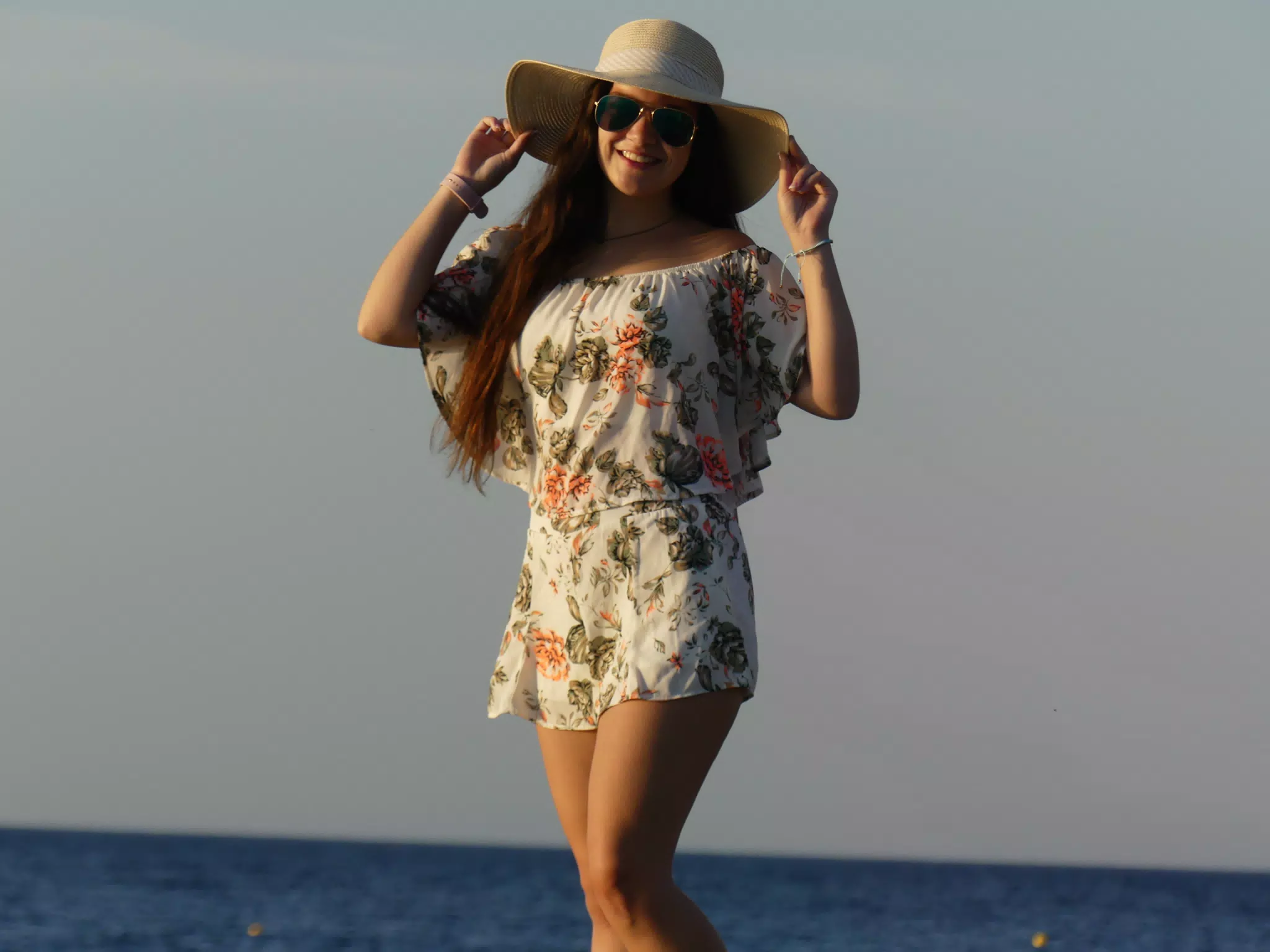 Emily on the Beach at Kamari in front of the Aegean Sea at Santorini