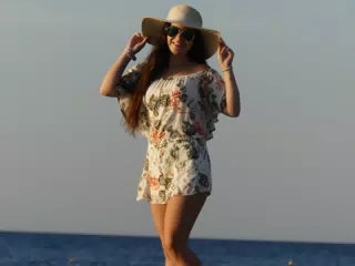 Emily on the Beach at Kamari in front of the Aegean Sea at Santorini