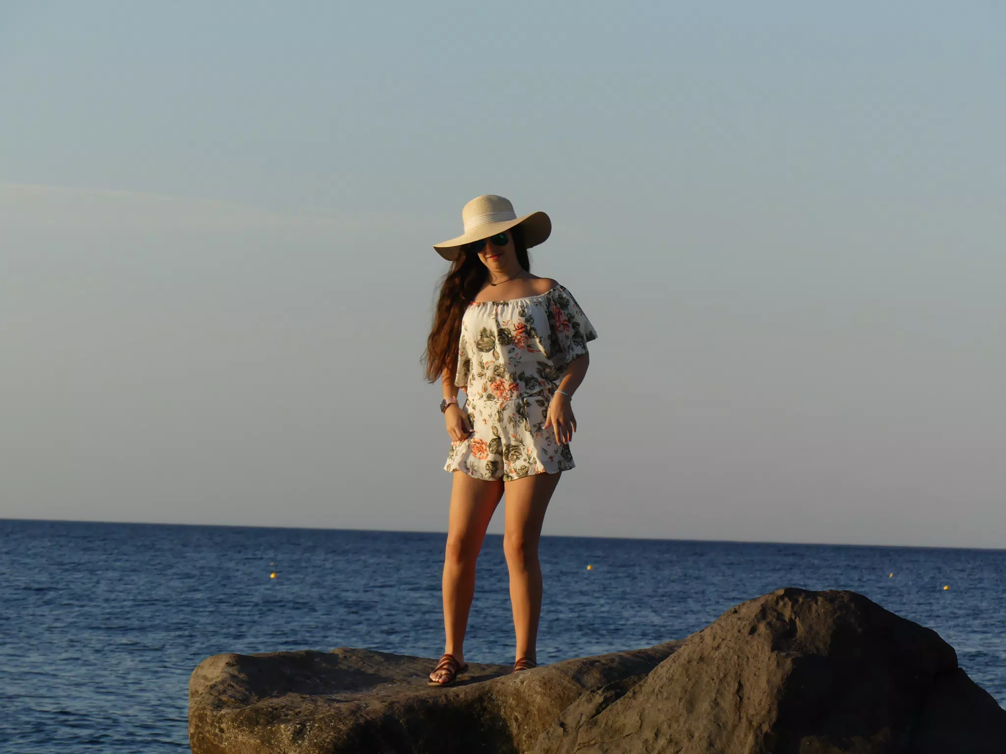 Emily on Rocks on Santorini Beach
