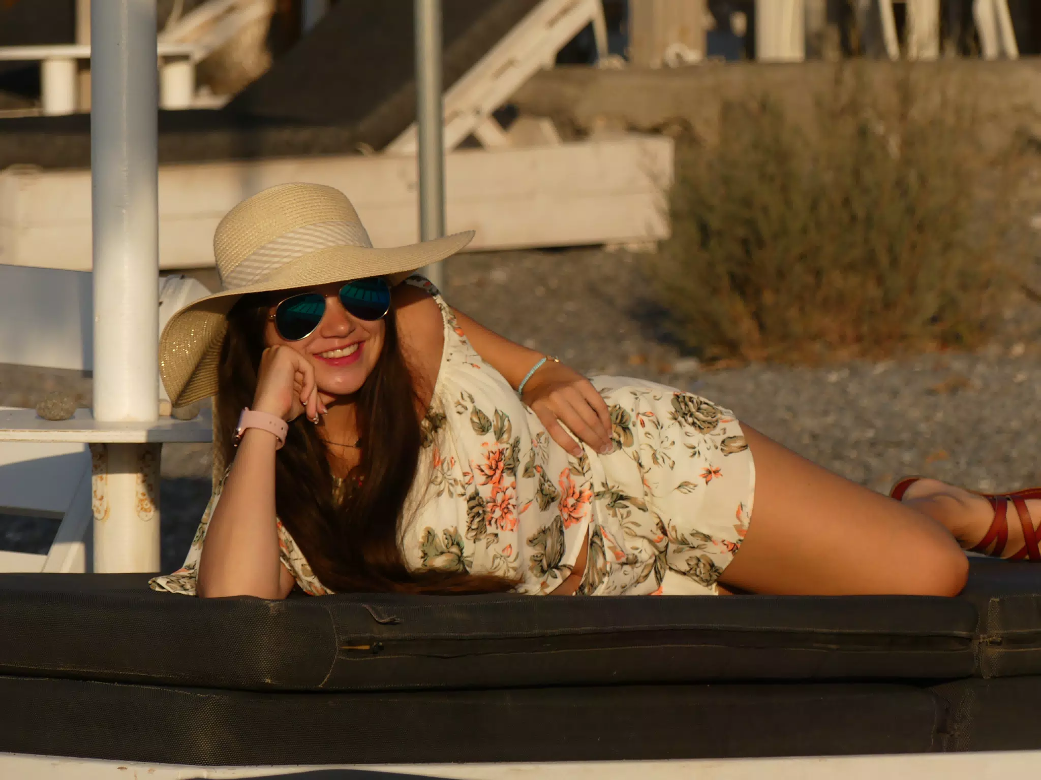 Emily Lounging on Santorini Beach